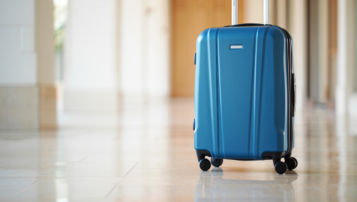 Blue carry-on suitcase